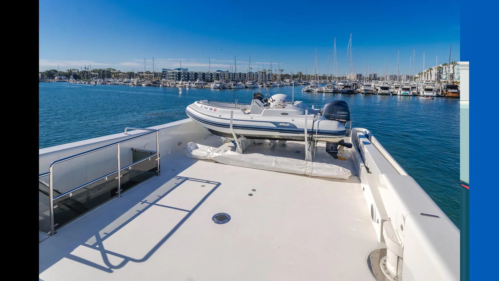 The yacht features a spacious deck with a tender and a jet ski, perfect for exploring the surrounding waters. aboard ACTIVE OCTO Yacht for Sale