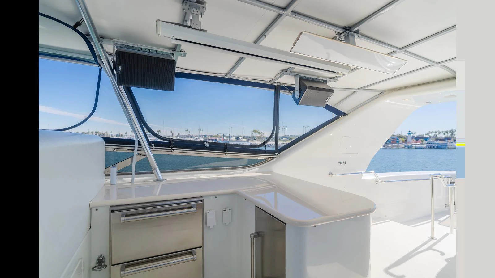 The helm area offers a sleek and modern design with ample natural light and a clear view of the surroundings. aboard ACTIVE OCTO Yacht for Sale