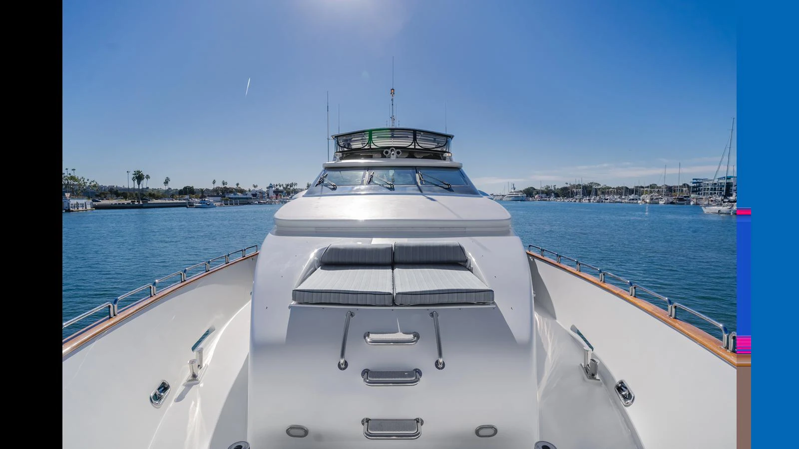 The yacht's foredeck offers a sleek and spacious area with sun pads for relaxation. aboard ACTIVE OCTO Yacht for Sale
