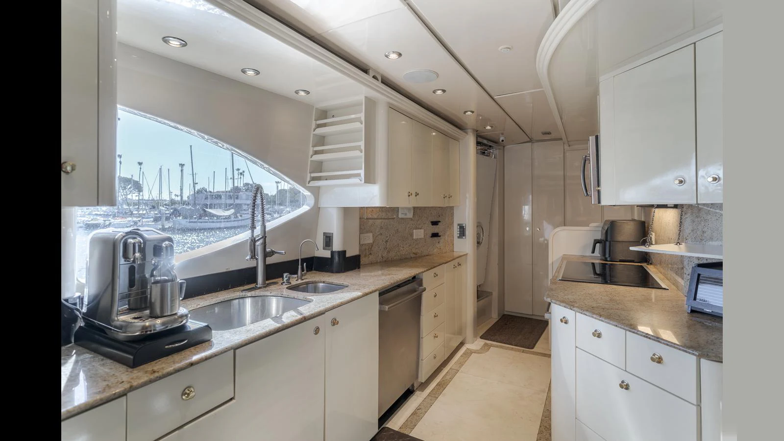 The galley features modern appliances and ample counter space, perfect for gourmet cooking at sea. aboard ACTIVE OCTO Yacht for Sale