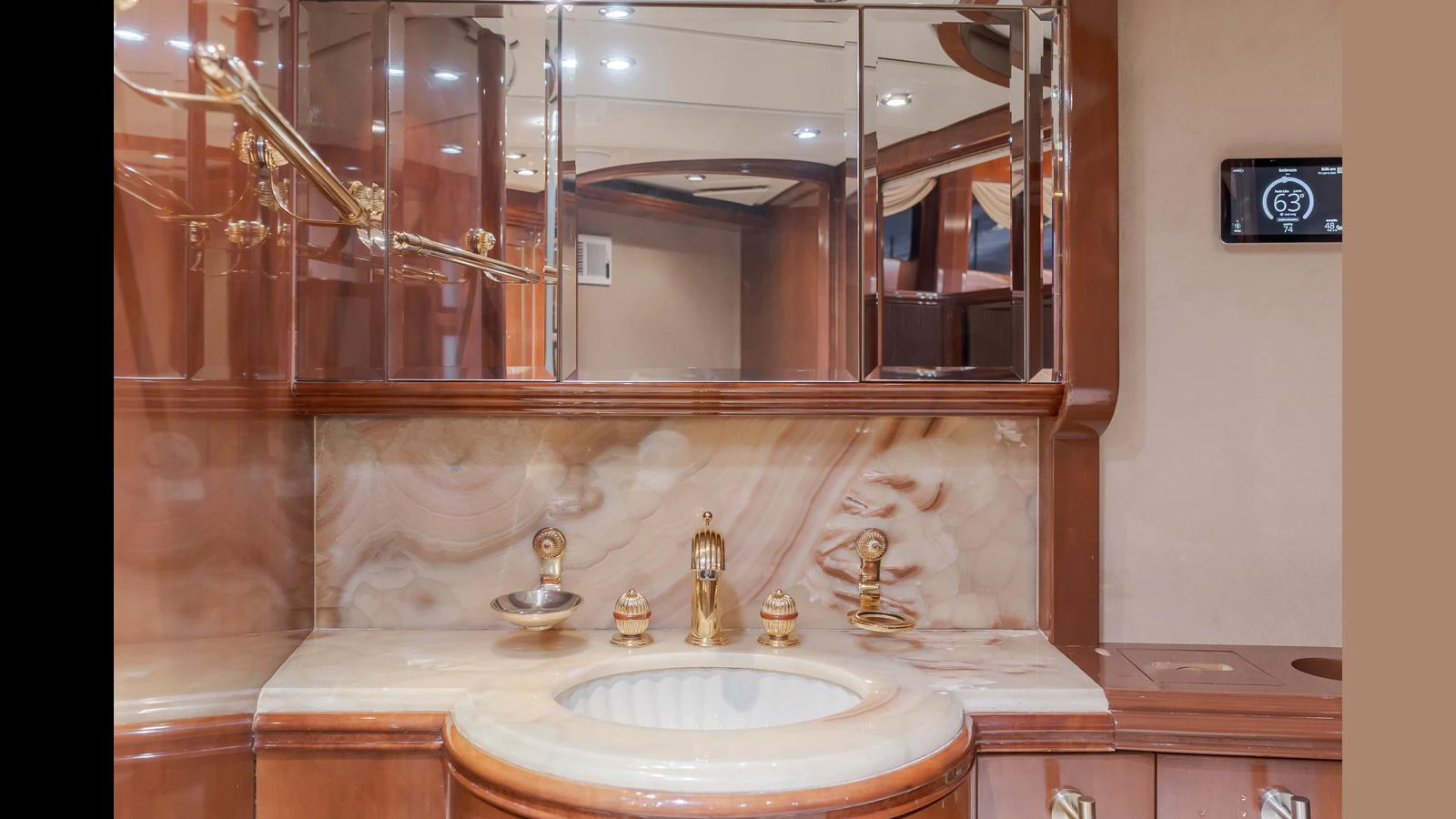 The yacht's bathroom features luxurious fixtures and a marble countertop. aboard ACTIVE OCTO Yacht for Sale