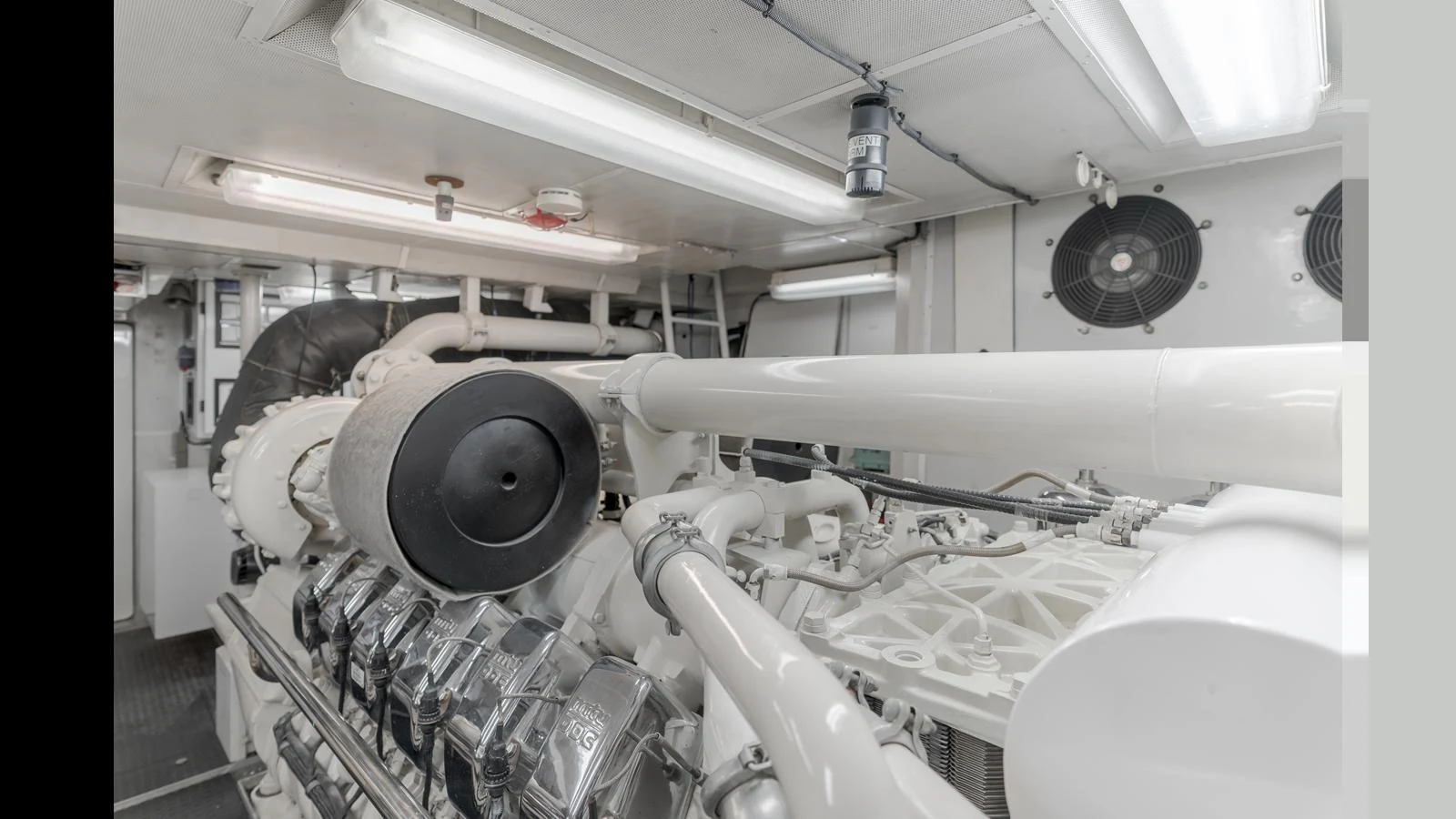 The image showcases the pristine and well-maintained engine room of the yacht. aboard ACTIVE OCTO Yacht for Sale