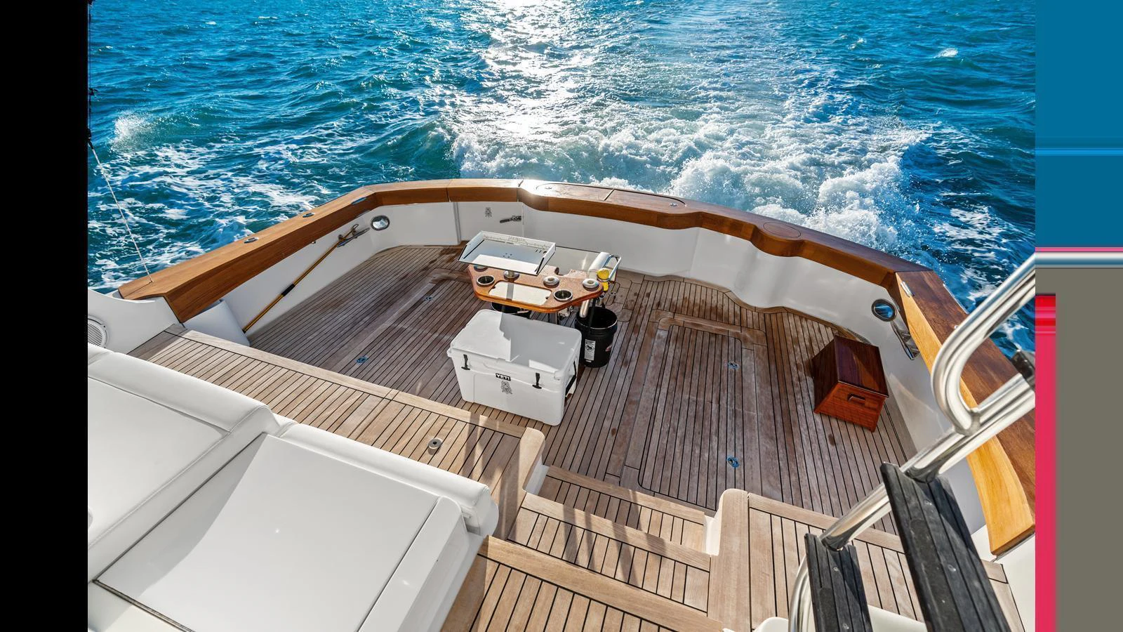 The aft deck offers a spacious and inviting area for relaxation with a view of the open sea. aboard FIRTH'S CHASM Yacht for Sale