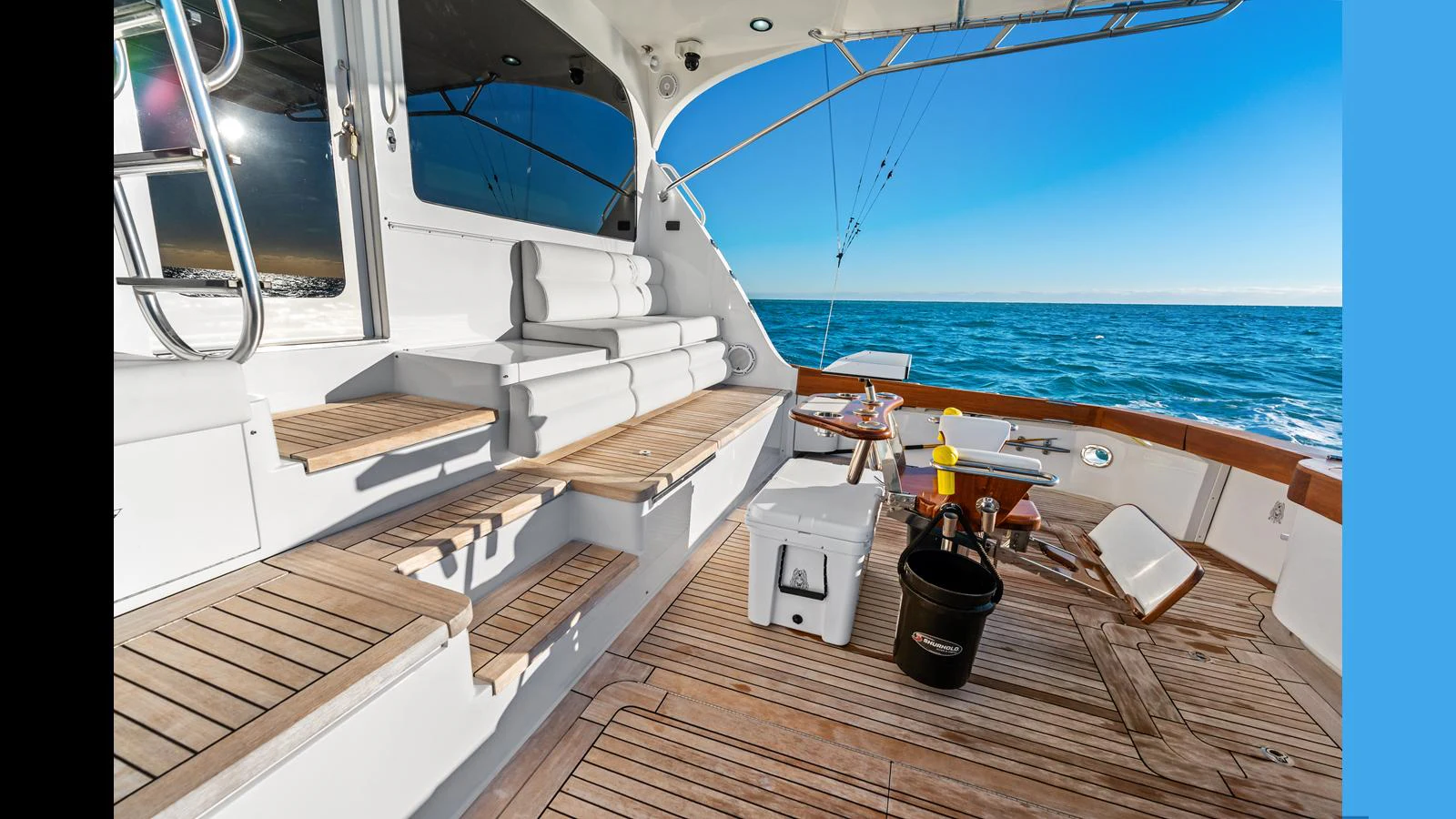 The aft deck offers a spacious and inviting area for relaxation and fishing with a stunning ocean view. aboard FIRTH'S CHASM Yacht for Sale