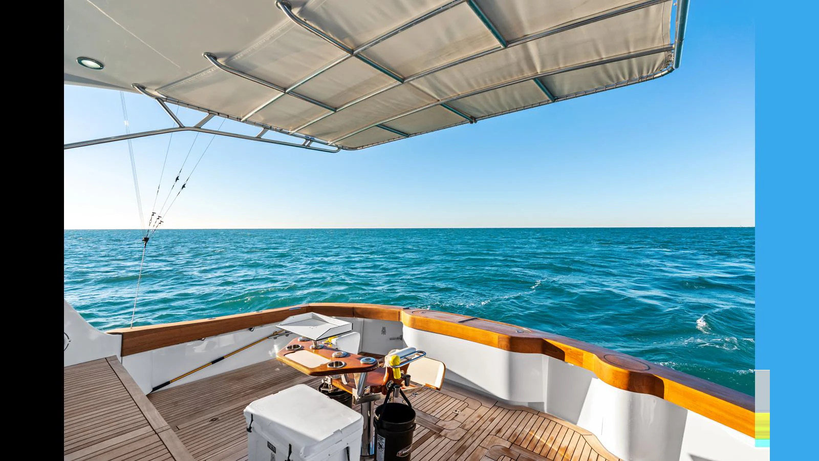 The aft deck offers a serene view of the open sea, perfect for relaxation and fishing. aboard FIRTH'S CHASM Yacht for Sale