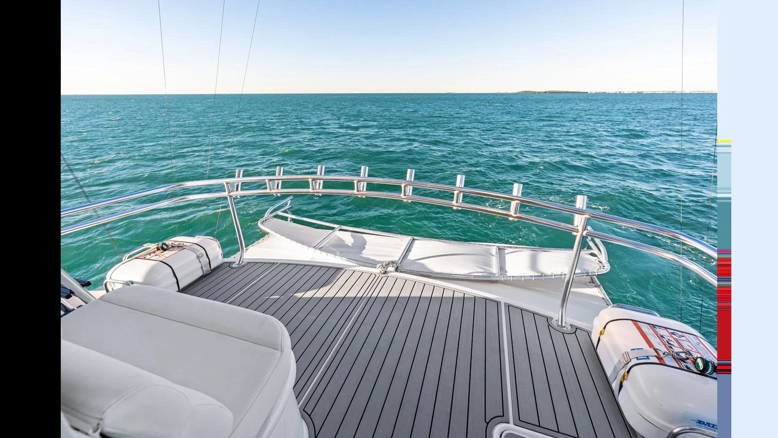 The aft deck offers a serene view of the open sea, perfect for relaxation and enjoying the horizon. aboard FIRTH'S CHASM Yacht for Sale