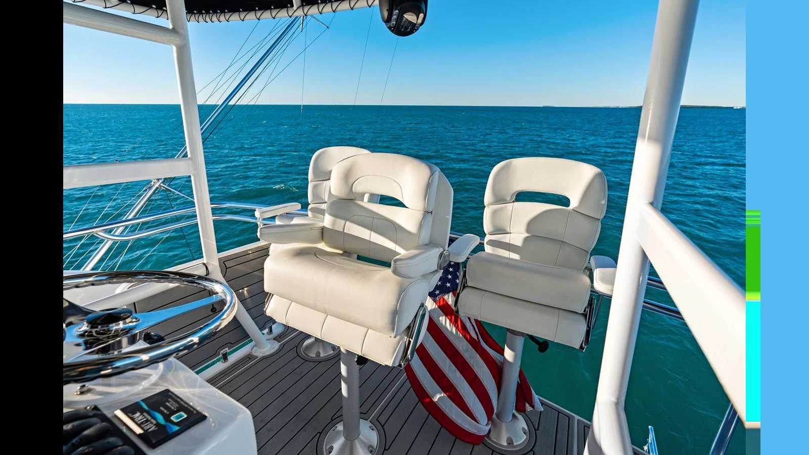The flybridge offers comfortable seating with a stunning view of the open sea. aboard FIRTH'S CHASM Yacht for Sale