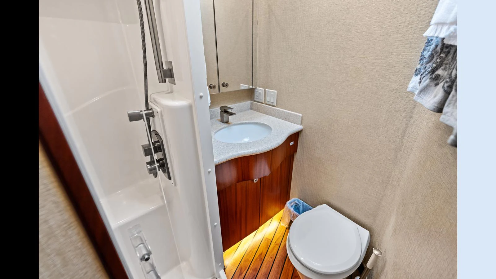 The yacht's bathroom features a compact yet stylish design with modern fixtures. aboard FIRTH'S CHASM Yacht for Sale
