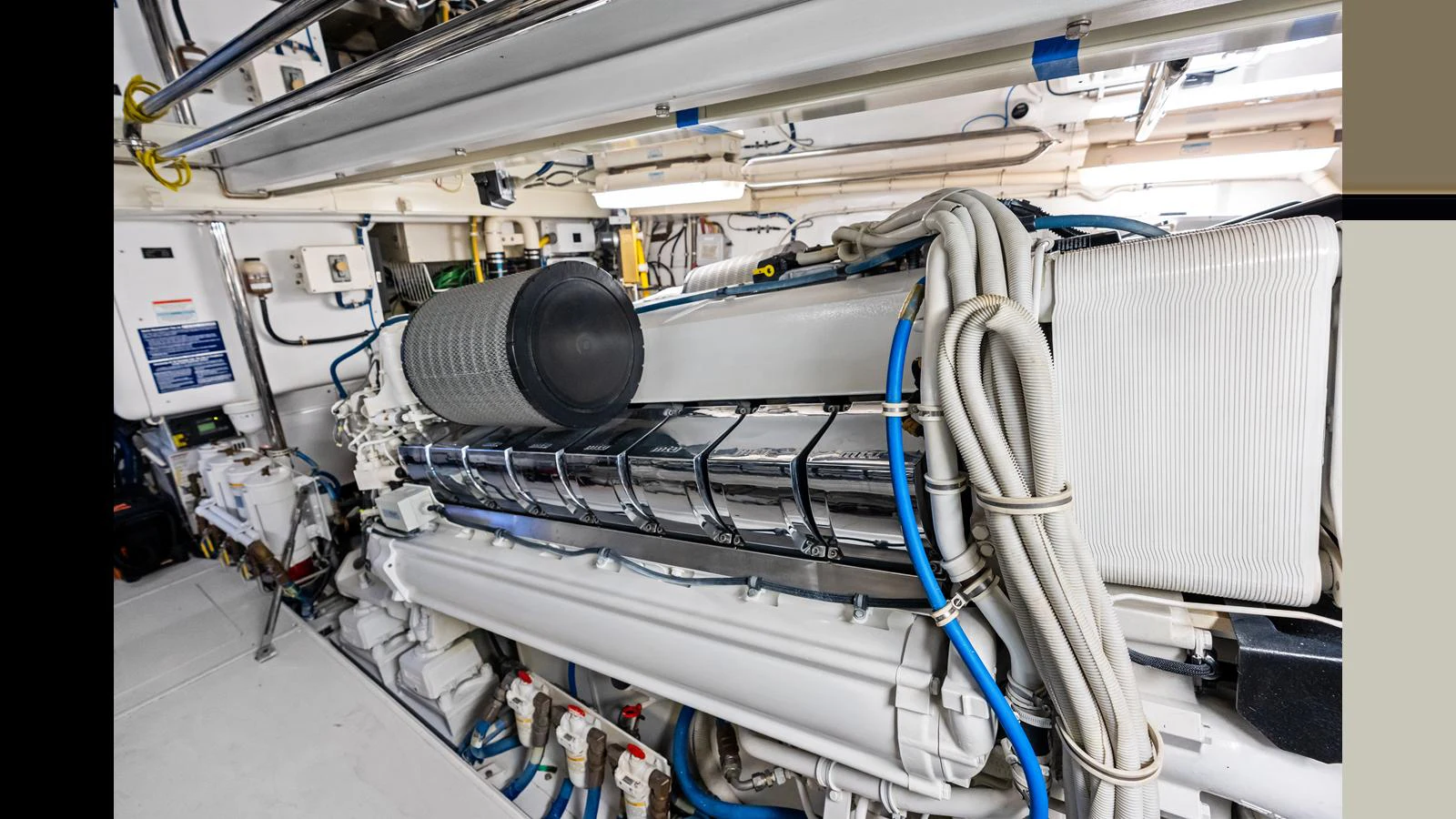 The image showcases the yacht's engine room with detailed machinery and equipment. aboard FIRTH'S CHASM Yacht for Sale