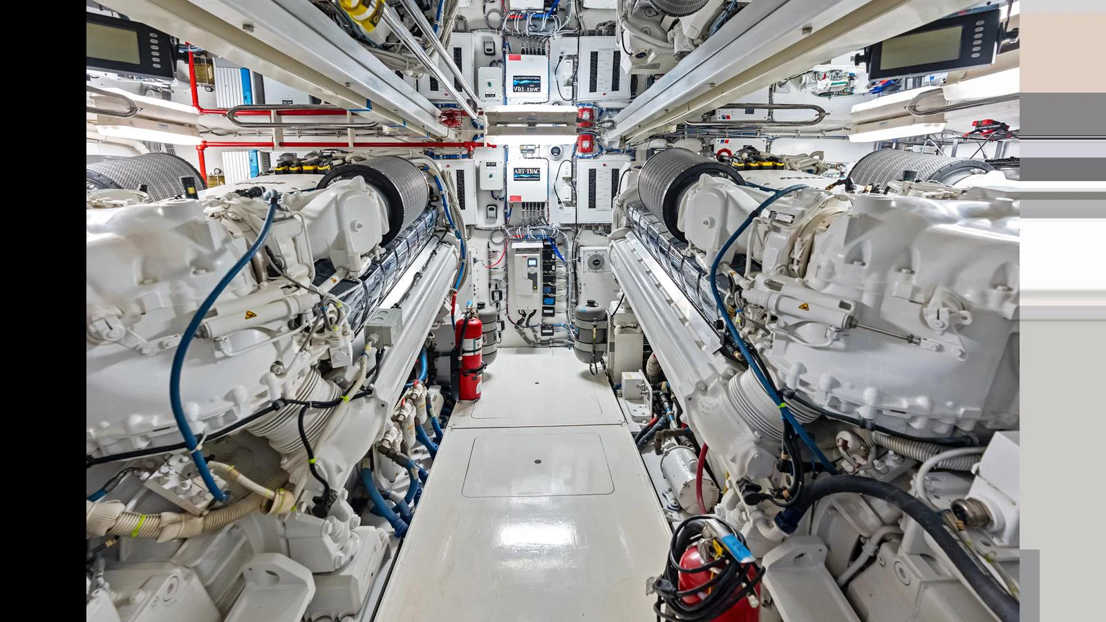 The image showcases the meticulously maintained engine room of the yacht, highlighting its powerful machinery. aboard FIRTH'S CHASM Yacht for Sale