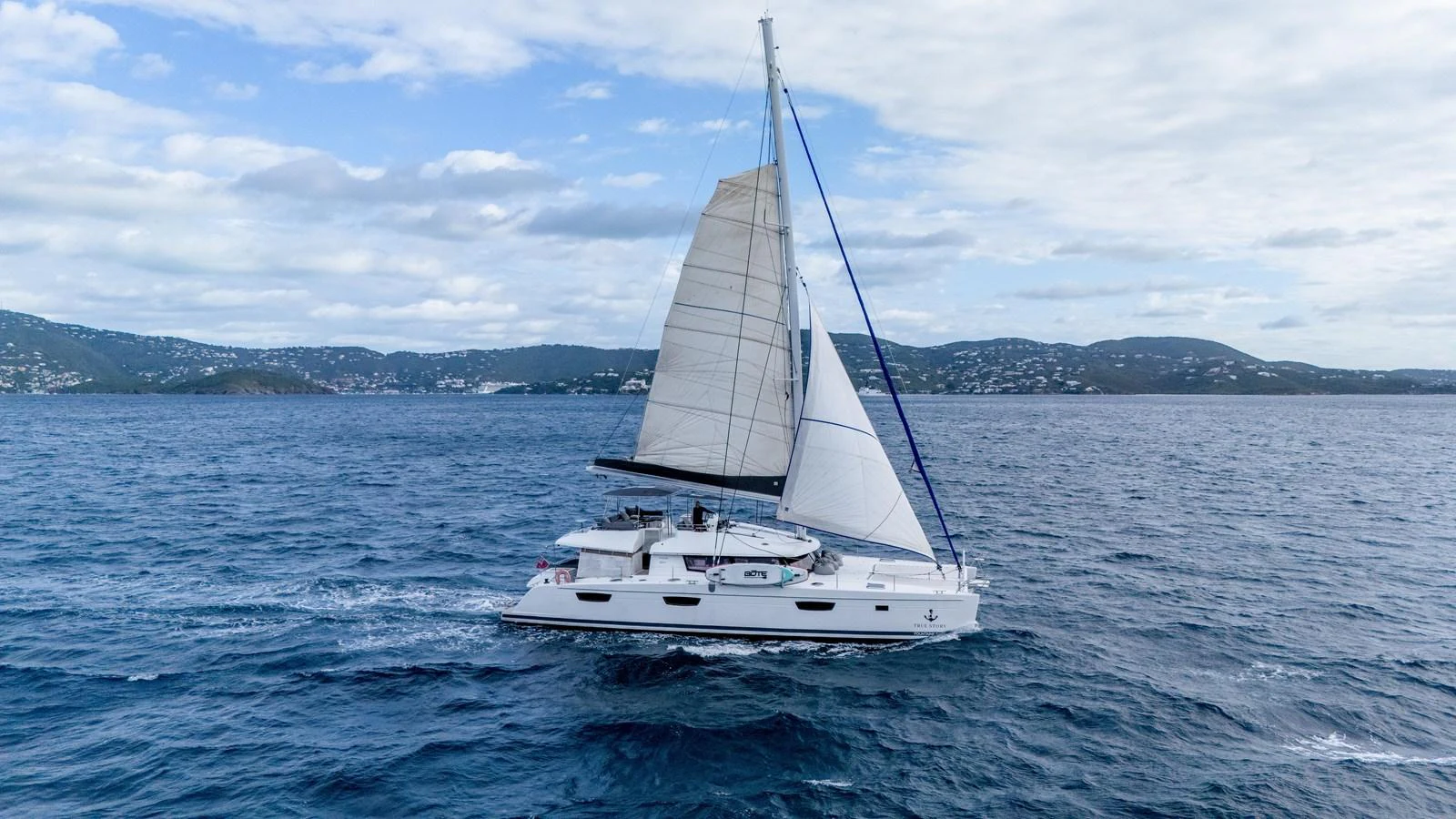 a boat in the water aboard TRUE STORY Yacht for Sale