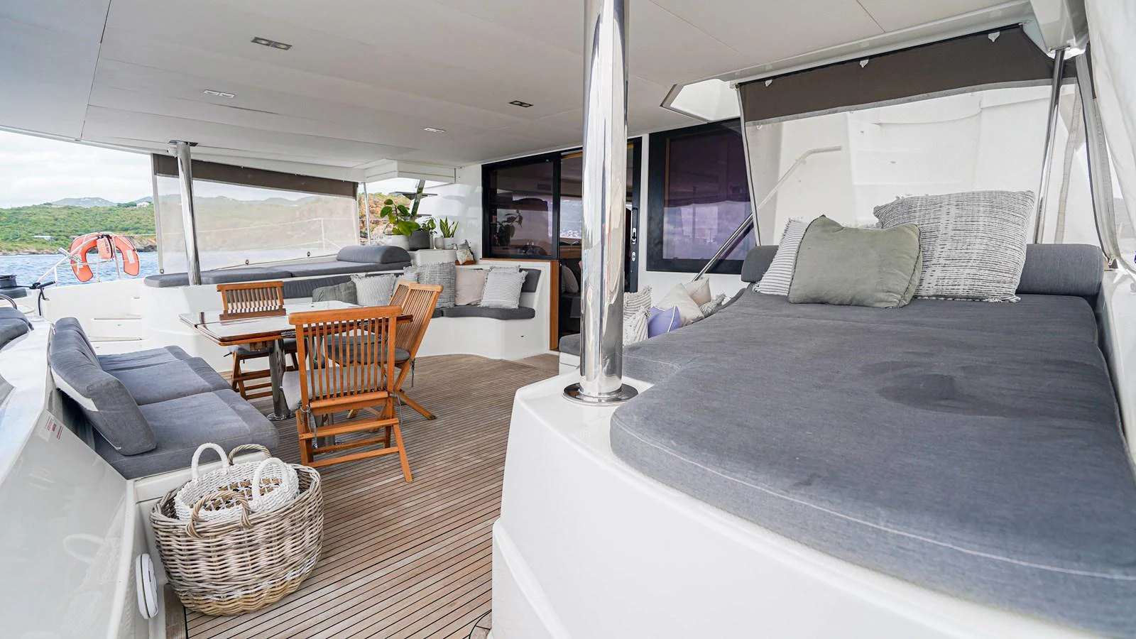 a large bedroom with a large bed aboard TRUE STORY Yacht for Sale