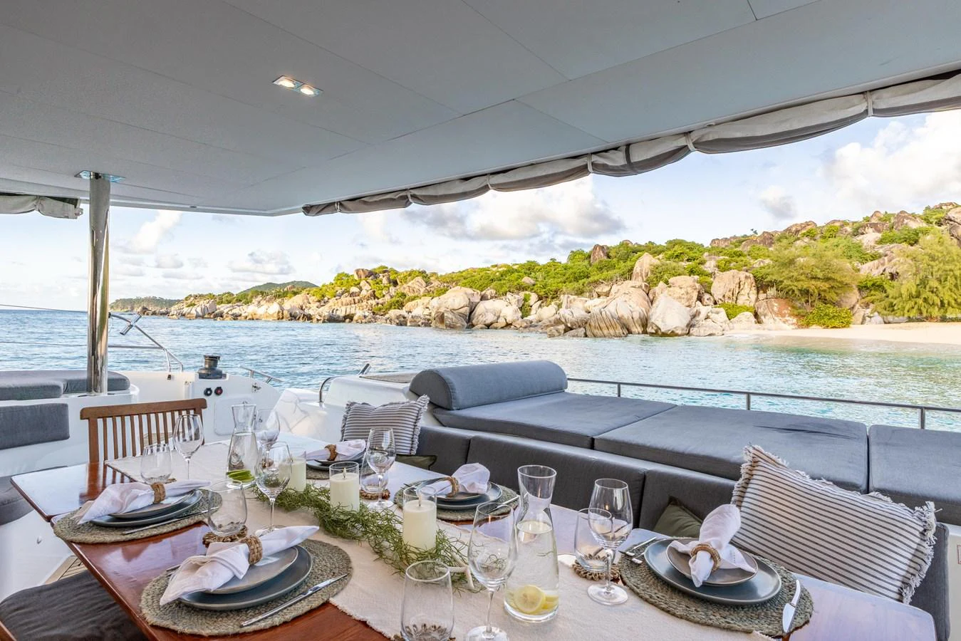 a table set for a meal aboard TRUE STORY Yacht for Sale