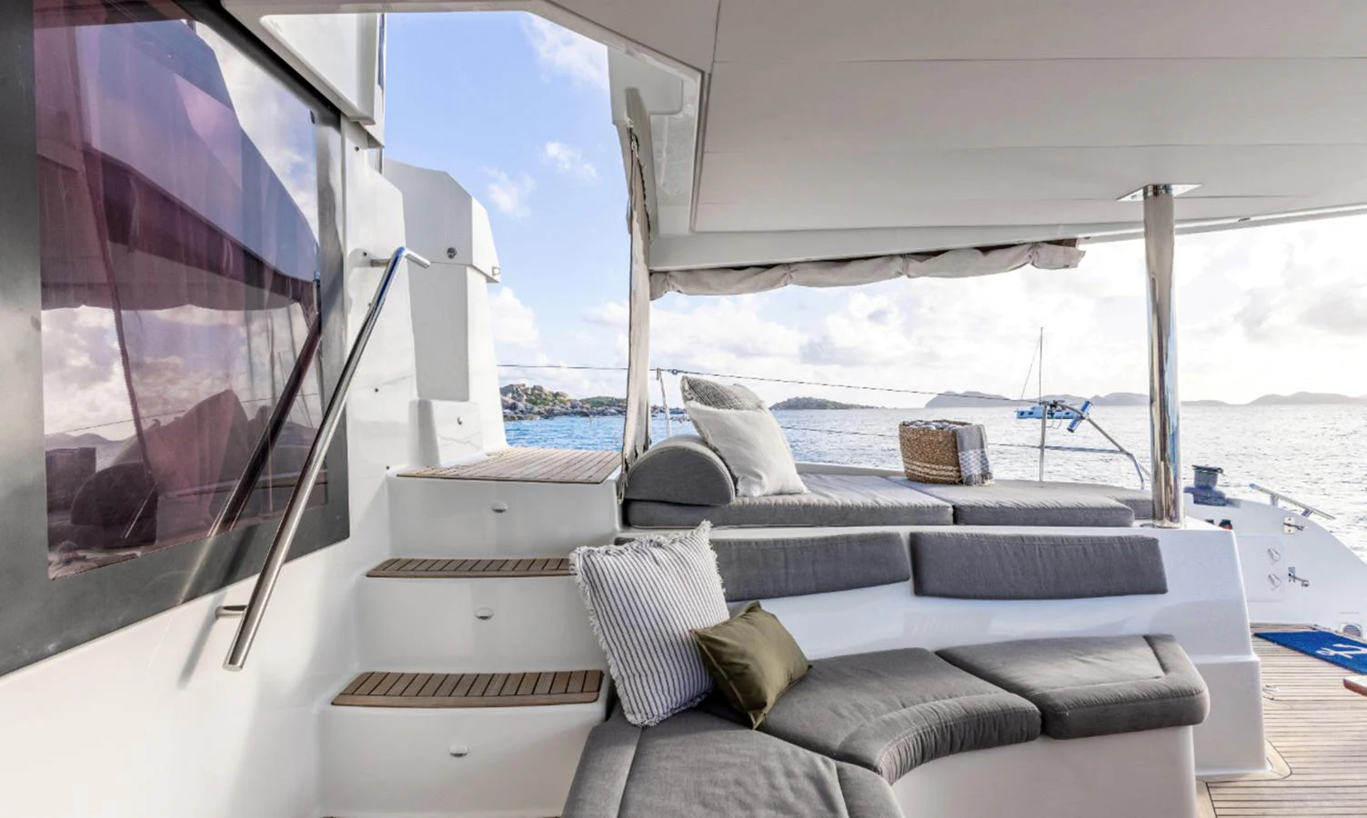a boat with a couch and a chair on the deck aboard TRUE STORY Yacht for Sale