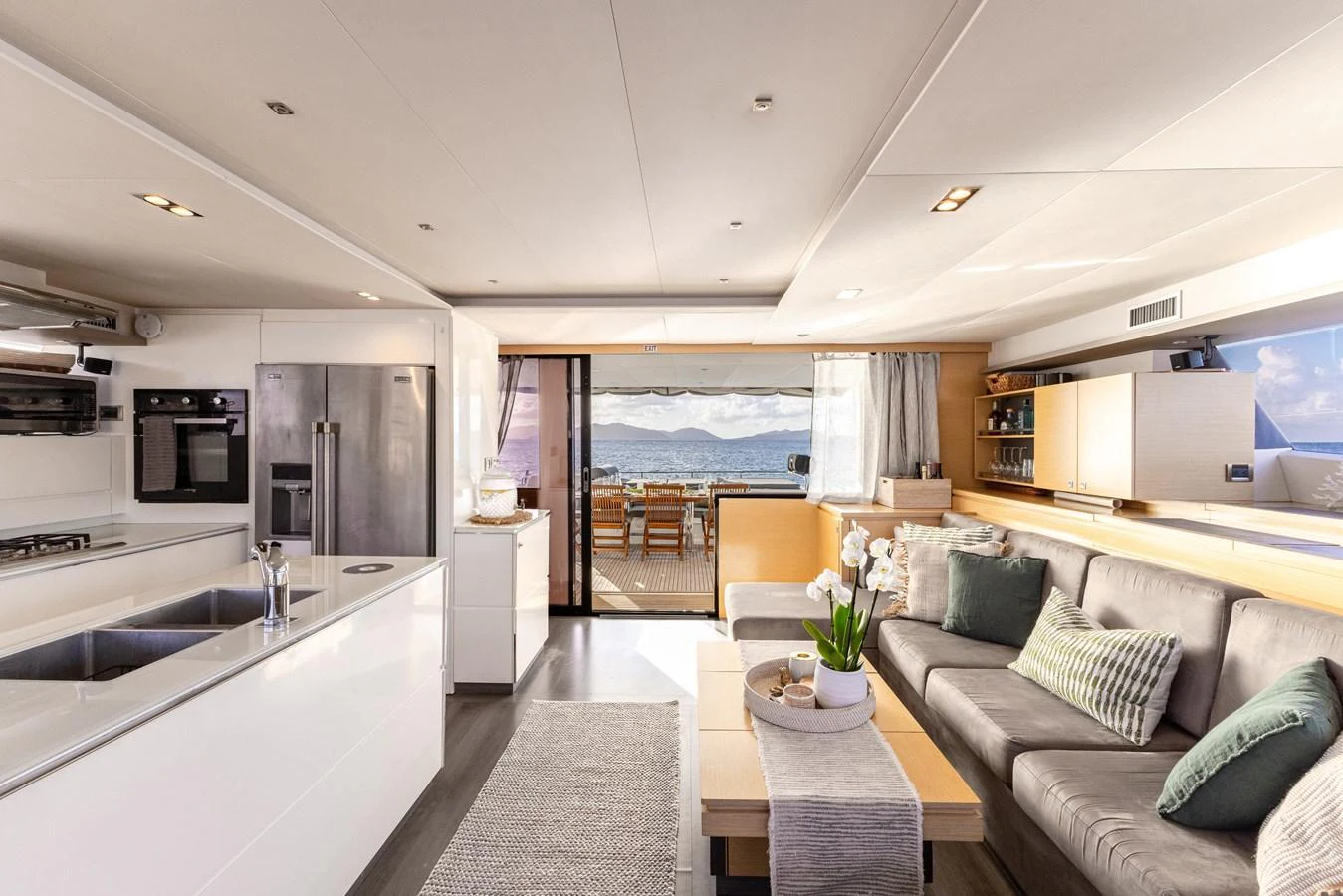 a modern looking kitchen and living room aboard TRUE STORY Yacht for Sale