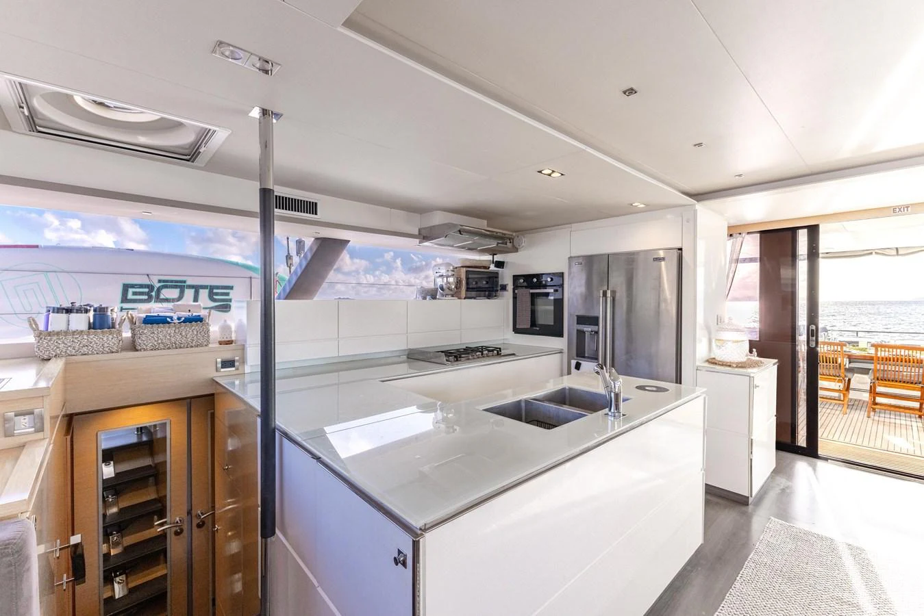 a kitchen with a large island aboard TRUE STORY Yacht for Sale