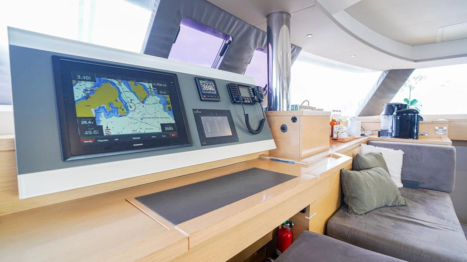 a room with a couch and a television aboard TRUE STORY Yacht for Sale