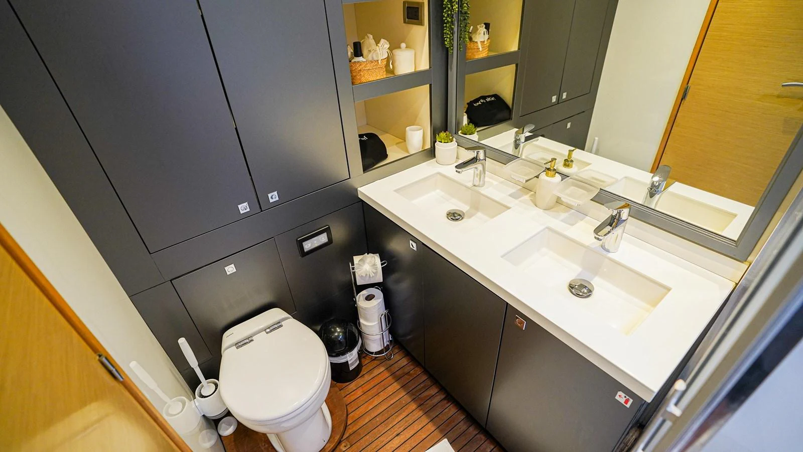 a bathroom with a sink and a toilet aboard TRUE STORY Yacht for Sale
