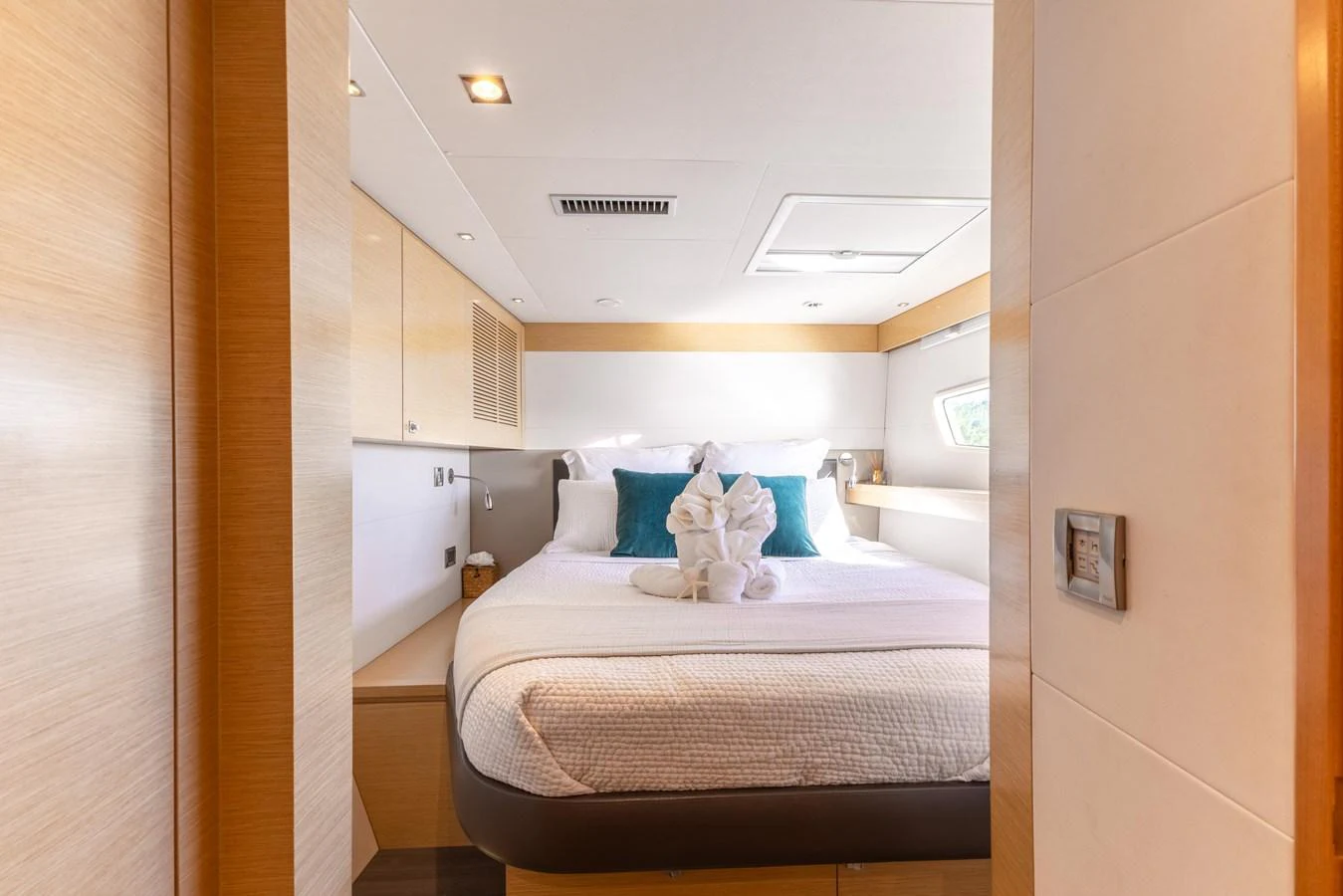 a small white bedroom aboard TRUE STORY Yacht for Sale