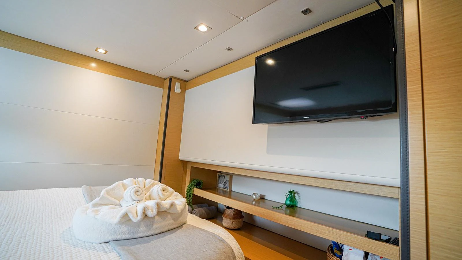 a tv on a wall aboard TRUE STORY Yacht for Sale
