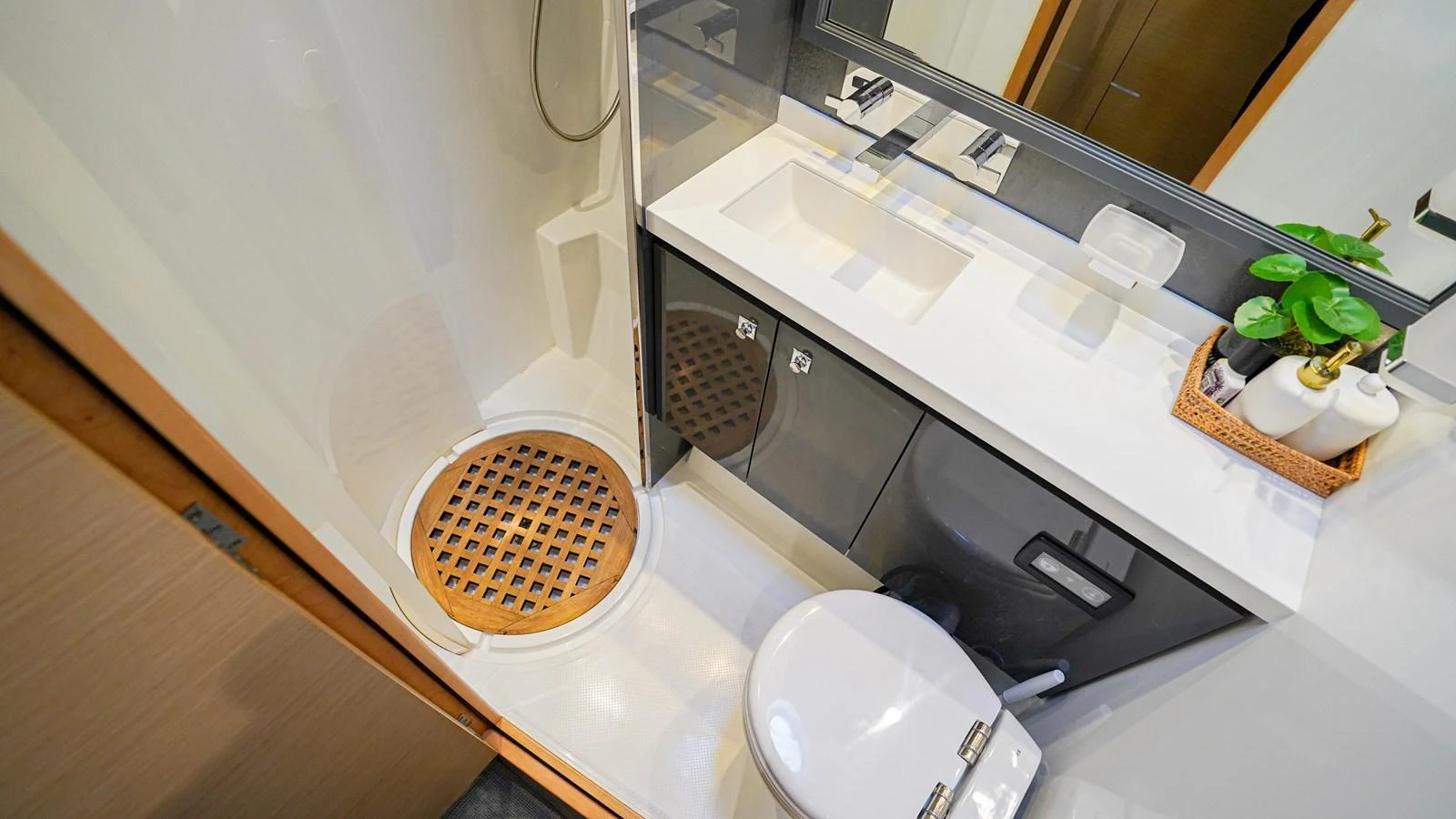 a bathroom with a sink and a mirror aboard TRUE STORY Yacht for Sale