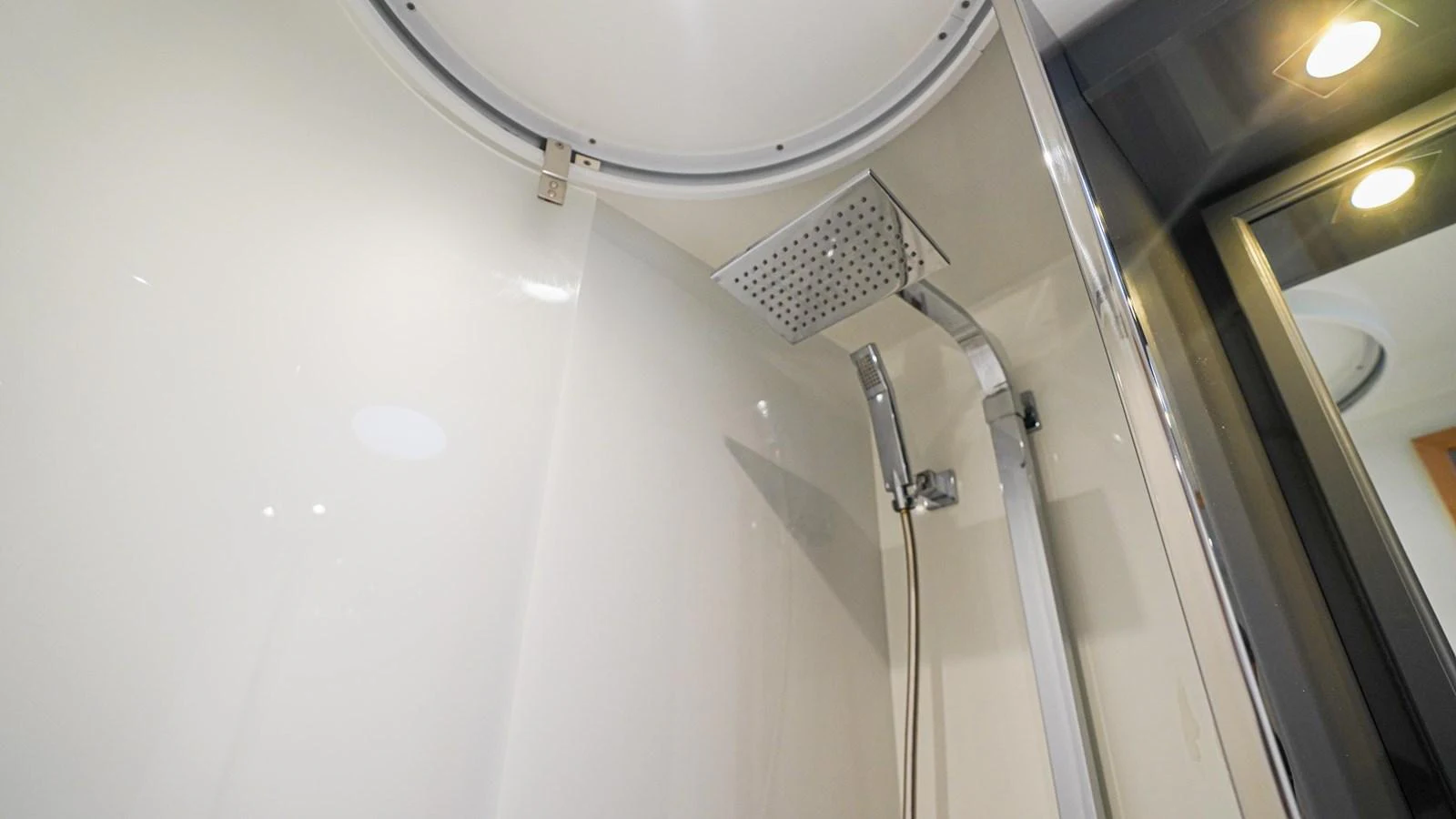 a shower with a metal faucet aboard TRUE STORY Yacht for Sale