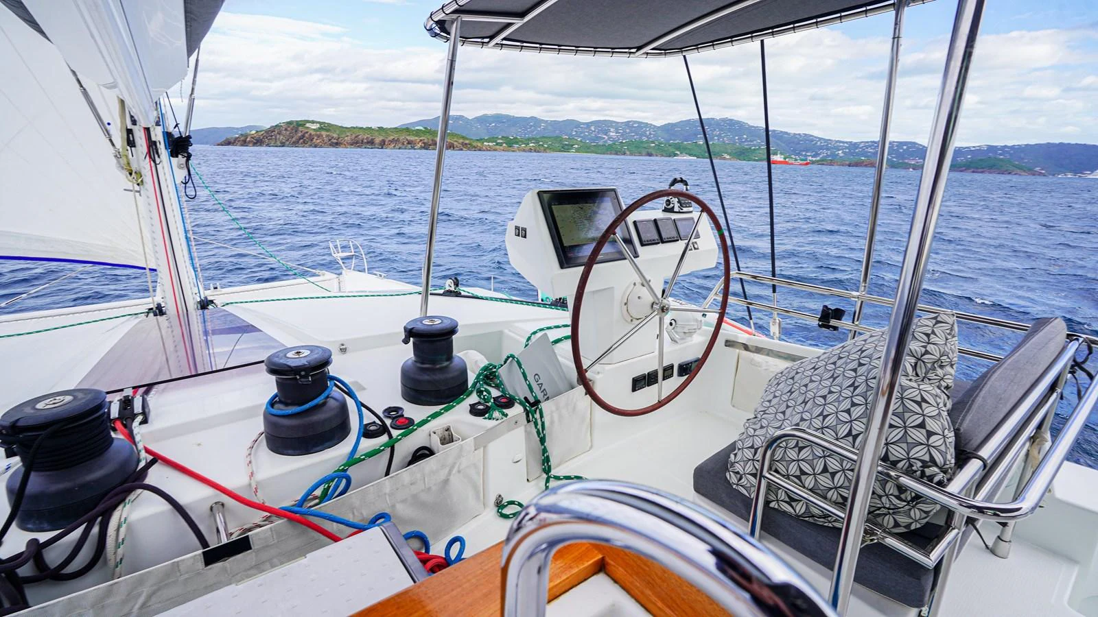 a boat with a large white sail aboard TRUE STORY Yacht for Sale