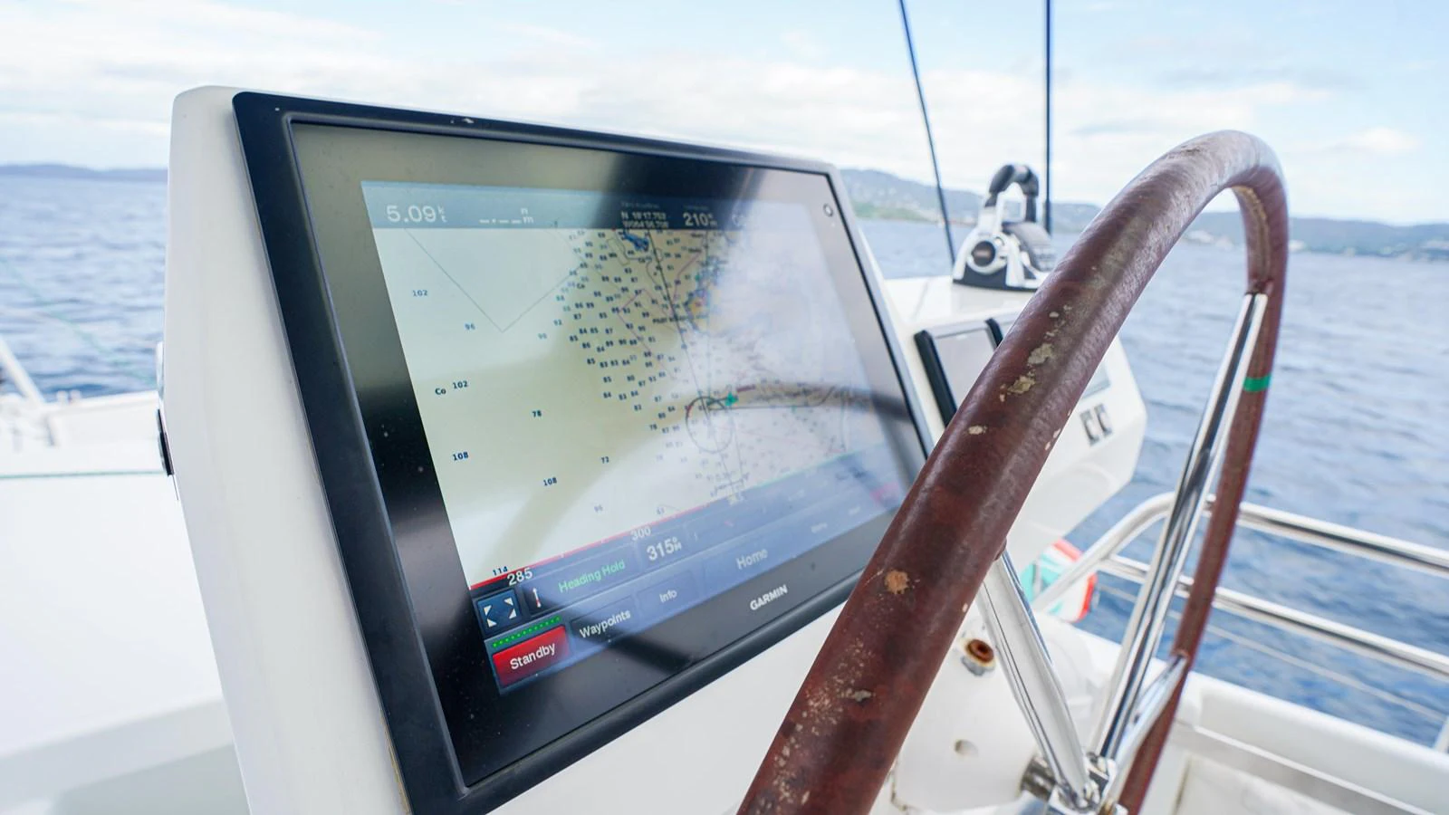 a tablet on a boat aboard TRUE STORY Yacht for Sale