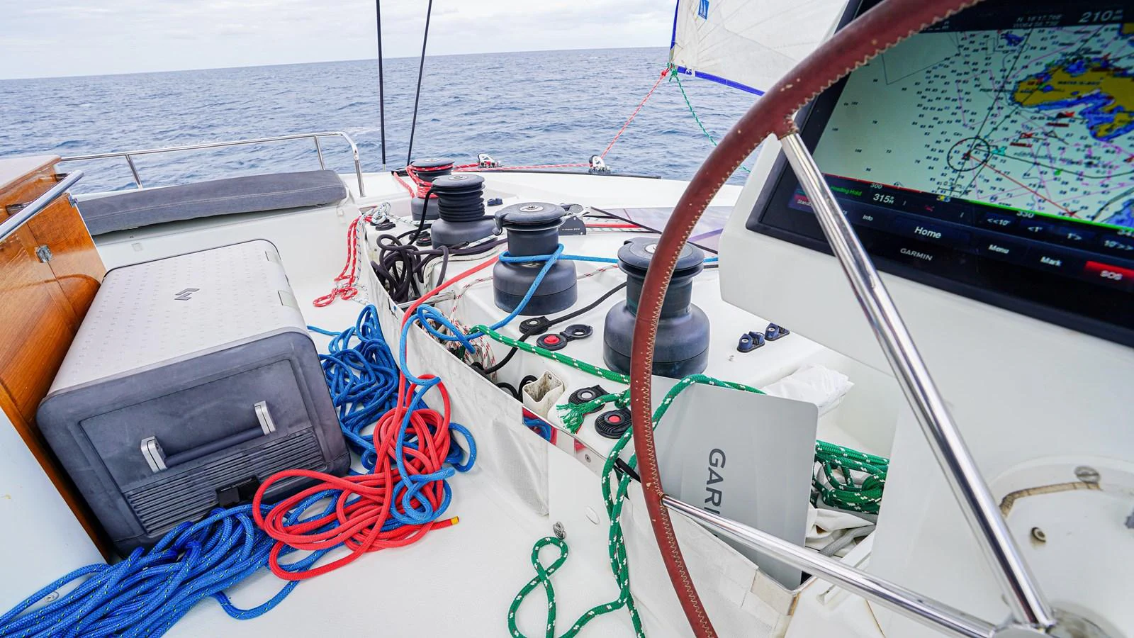 a boat with a large sail aboard TRUE STORY Yacht for Sale