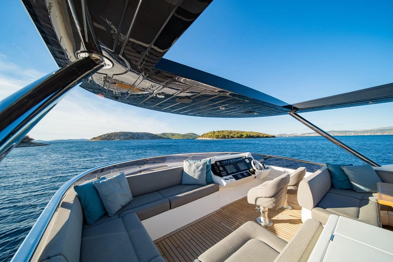 The flybridge offers a luxurious seating area with panoramic views of the surrounding waters. aboard BLACK MAMBA Yacht for Sale