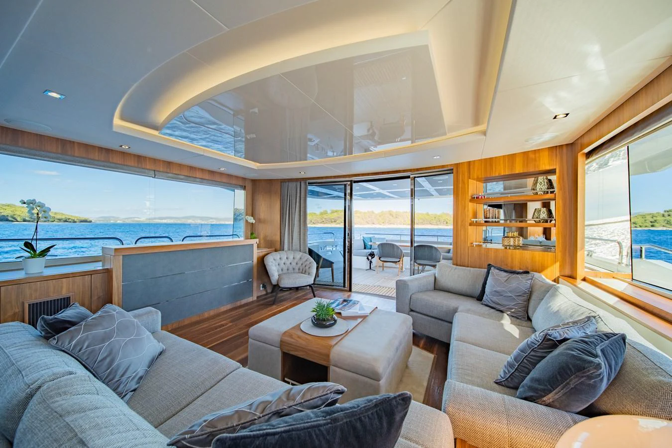 The salon offers a spacious and luxurious seating area with panoramic views of the surrounding waters. aboard BLACK MAMBA Yacht for Sale