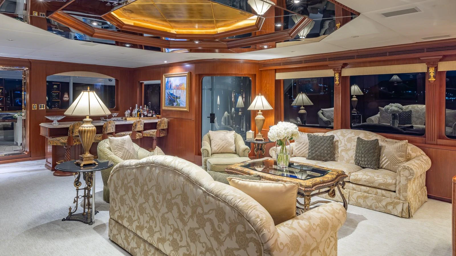 The luxurious salon features elegant furnishings and a sophisticated ambiance. aboard RELENTLESS Yacht for Sale