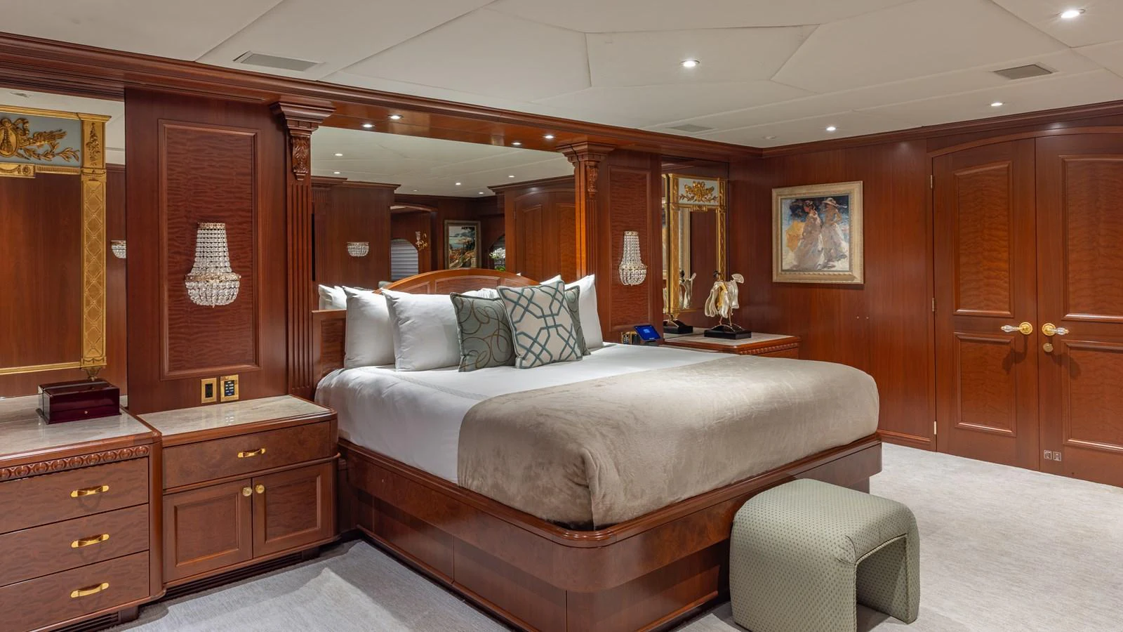 The master stateroom features luxurious wood paneling and elegant decor, creating a warm and inviting atmosphere. aboard RELENTLESS Yacht for Sale