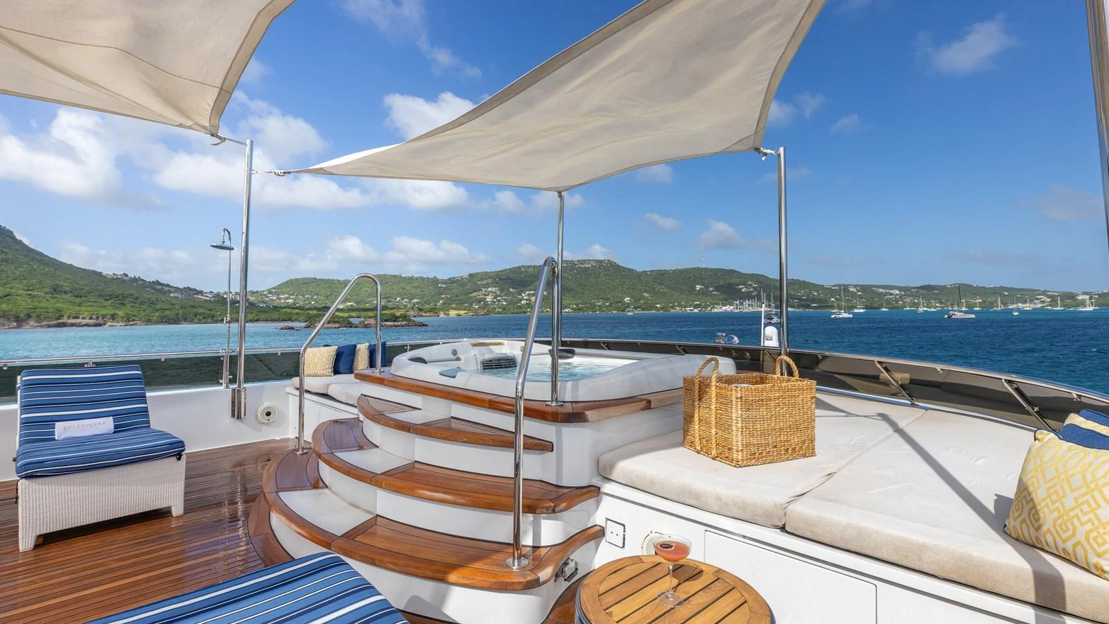 The sundeck features a luxurious jacuzzi with stunning views of the surrounding waters. aboard RELENTLESS Yacht for Sale