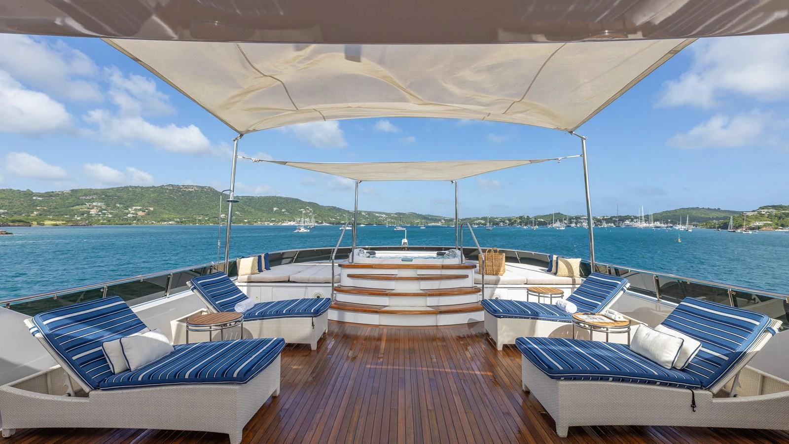 The sundeck offers a luxurious space with ample seating and stunning views of the surrounding waters. aboard RELENTLESS Yacht for Sale