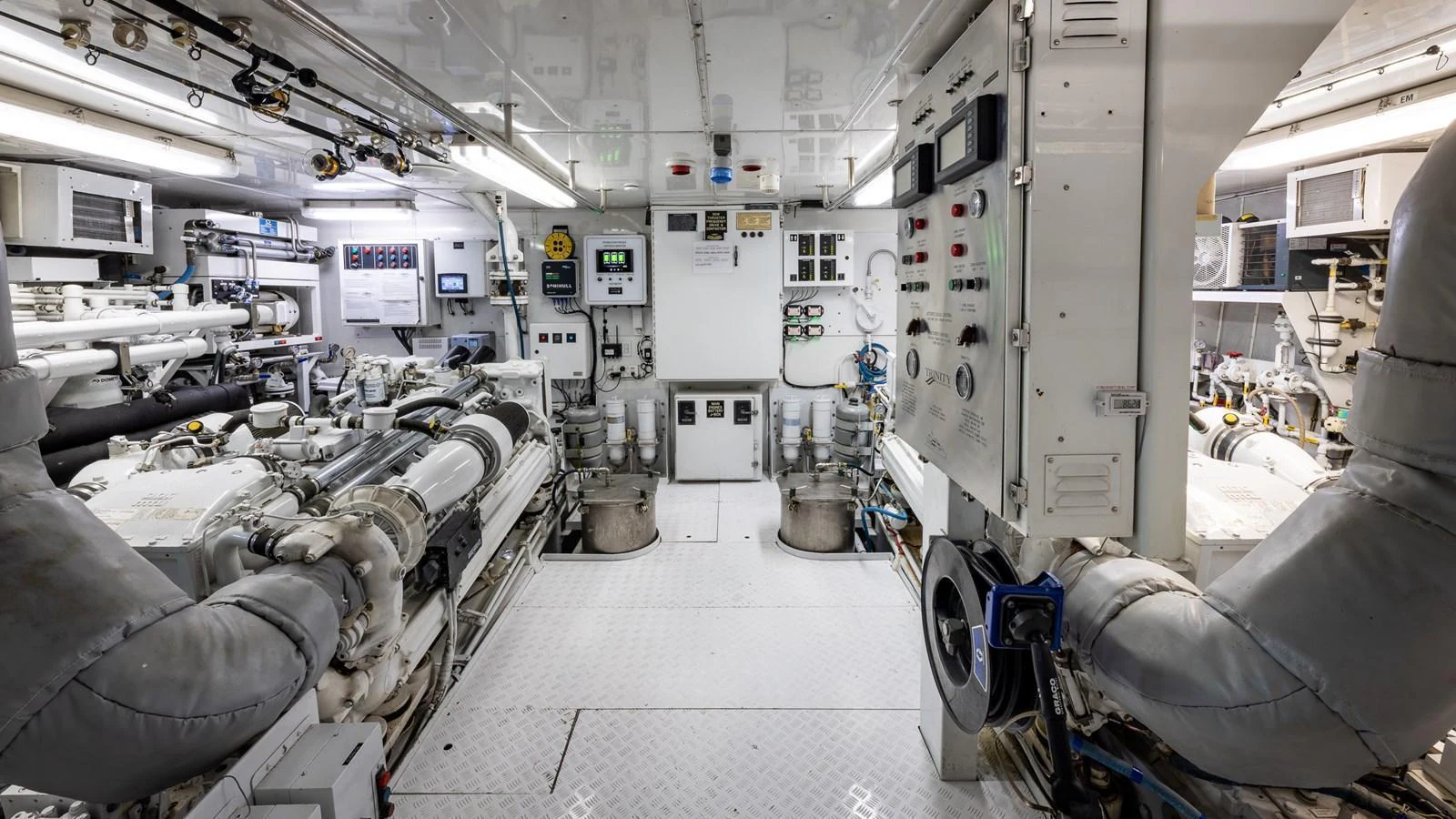 The engine room is equipped with advanced machinery and control panels, showcasing the yacht's technical prowess. aboard RELENTLESS Yacht for Sale