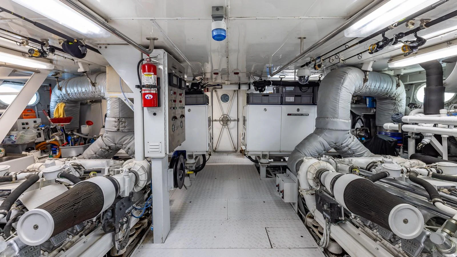 The engine room is meticulously organized, showcasing advanced machinery and equipment. aboard RELENTLESS Yacht for Sale