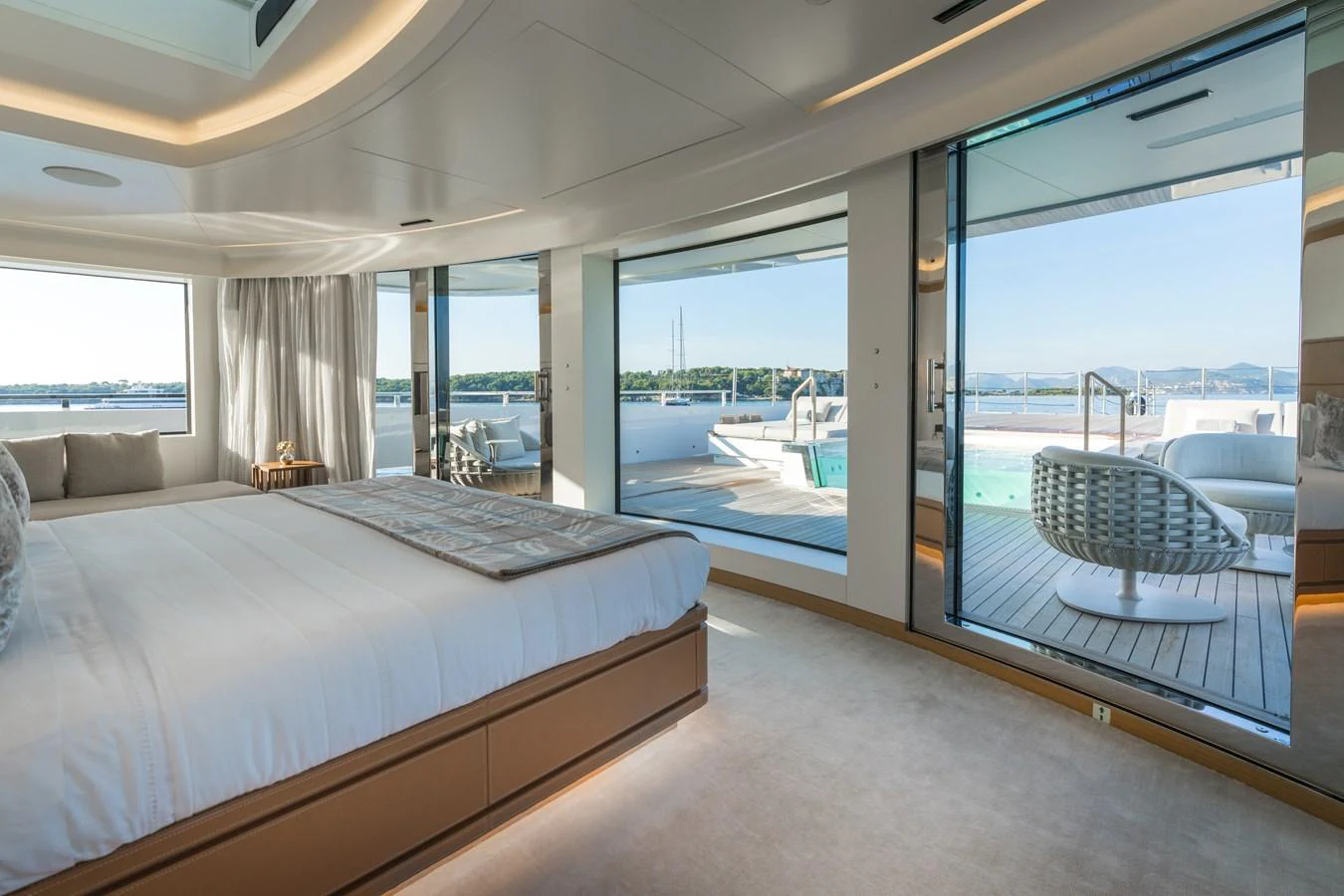 The master stateroom offers a luxurious retreat with panoramic views and direct access to the deck. aboard ALCHEMIST Yacht for Sale