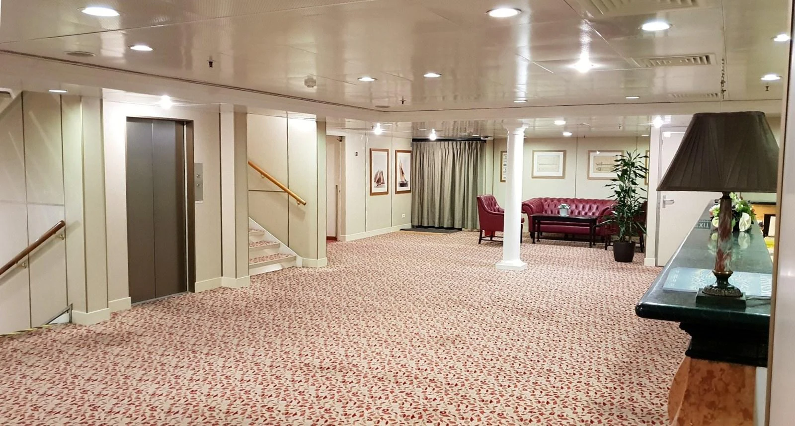 A spacious and elegantly decorated interior lounge area with comfortable seating and tasteful decor. aboard MINERVA Yacht for Sale