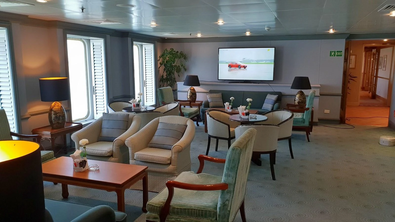 The salon features comfortable seating and a large television for entertainment. aboard MINERVA Yacht for Sale