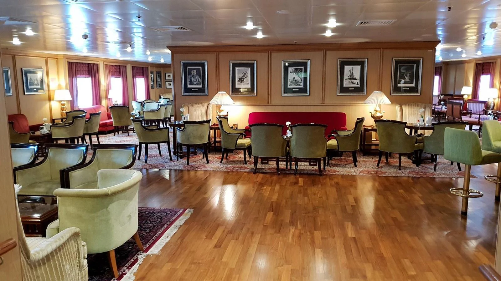 The yacht's lounge area features elegant seating arrangements and tasteful decor. aboard MINERVA Yacht for Sale