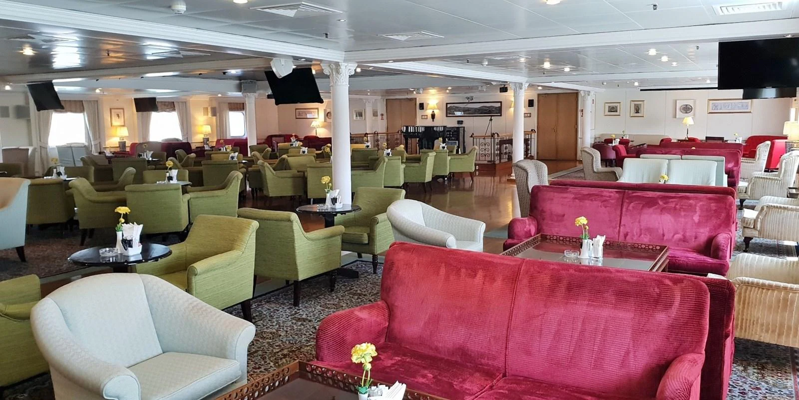 The spacious interior lounge area features comfortable seating and elegant decor. aboard MINERVA Yacht for Sale