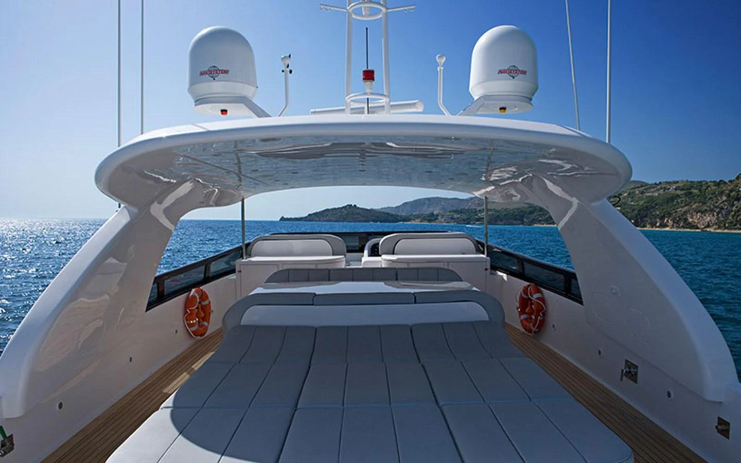 The yacht's sundeck offers a spacious and inviting area for relaxation with stunning views of the surrounding waters. aboard NIKCA Yacht for Sale