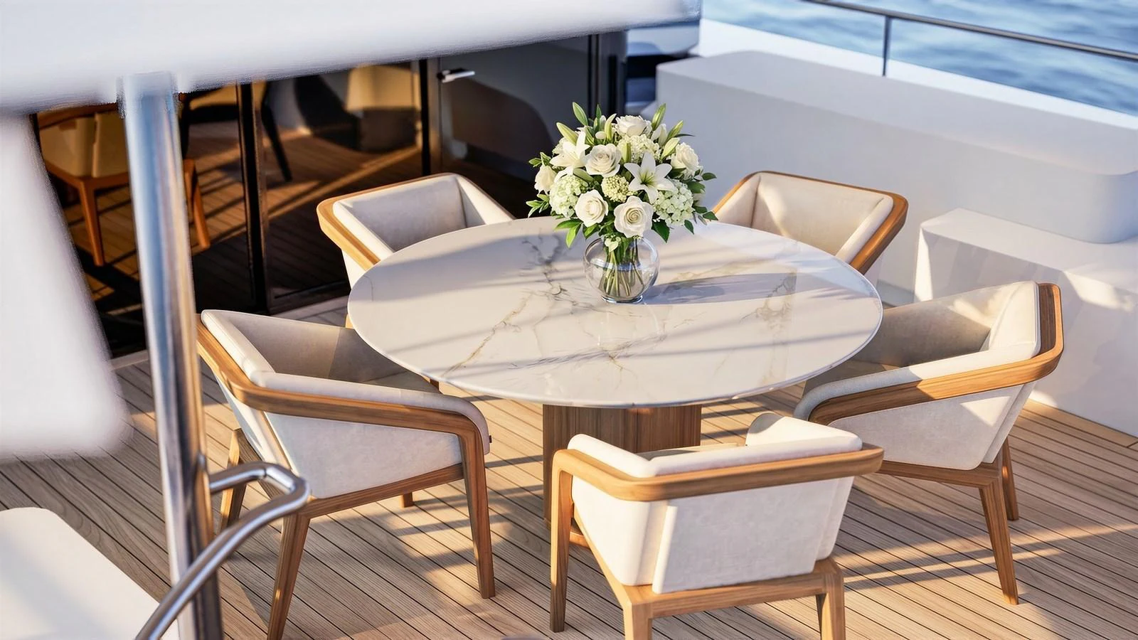 An elegant alfresco dining area with a marble table and comfortable chairs on the yacht's deck. aboard YN208 Yacht for Sale