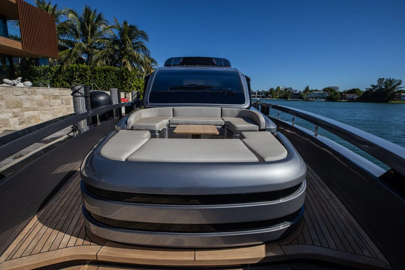 The yacht's foredeck features a luxurious sunpad with a sleek, modern design. aboard CIAO Yacht for Sale