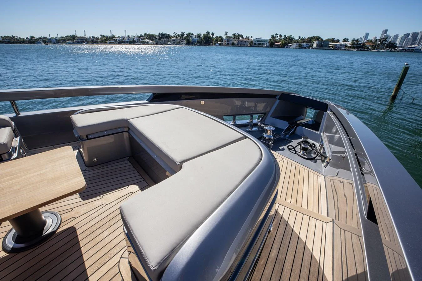The bow of the yacht features a spacious seating area with a sleek design, perfect for enjoying the view. aboard CIAO Yacht for Sale