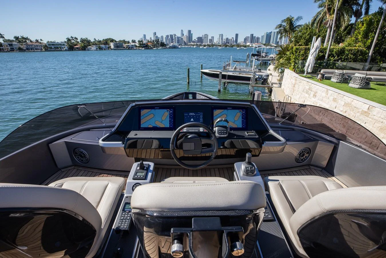 The helm offers a sophisticated command center with a stunning waterfront view. aboard CIAO Yacht for Sale