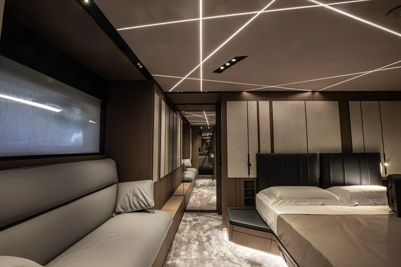 The stateroom features modern design with sleek lines and luxurious furnishings. aboard CIAO Yacht for Sale