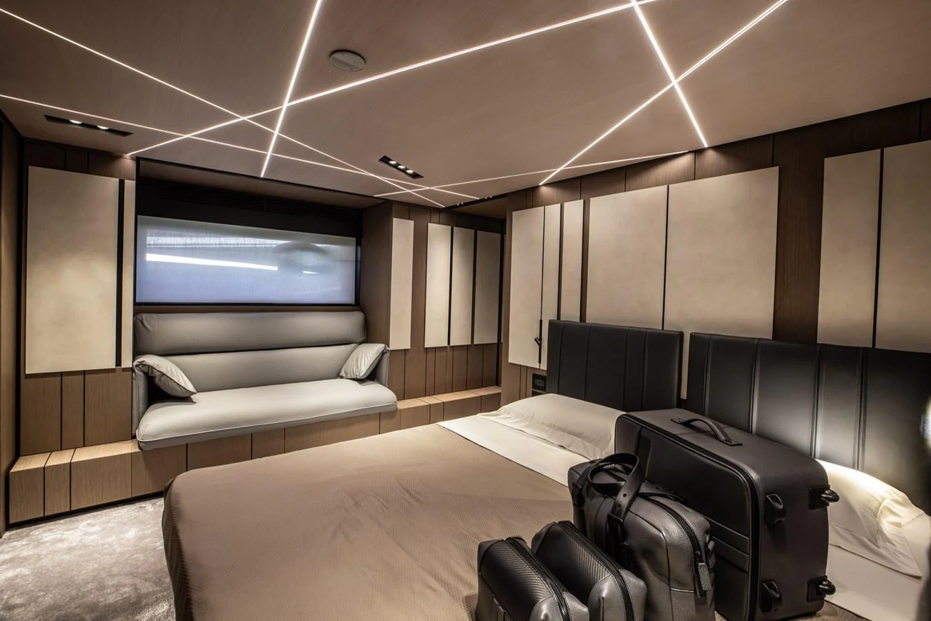 The stateroom features modern design elements with sleek lines and luxurious furnishings. aboard CIAO Yacht for Sale