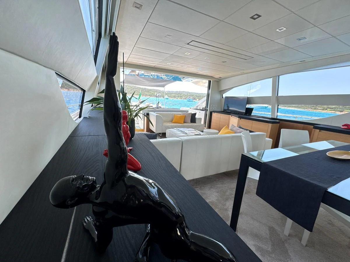 The salon features modern decor with large windows offering stunning ocean views. aboard THYKE III Yacht for Sale